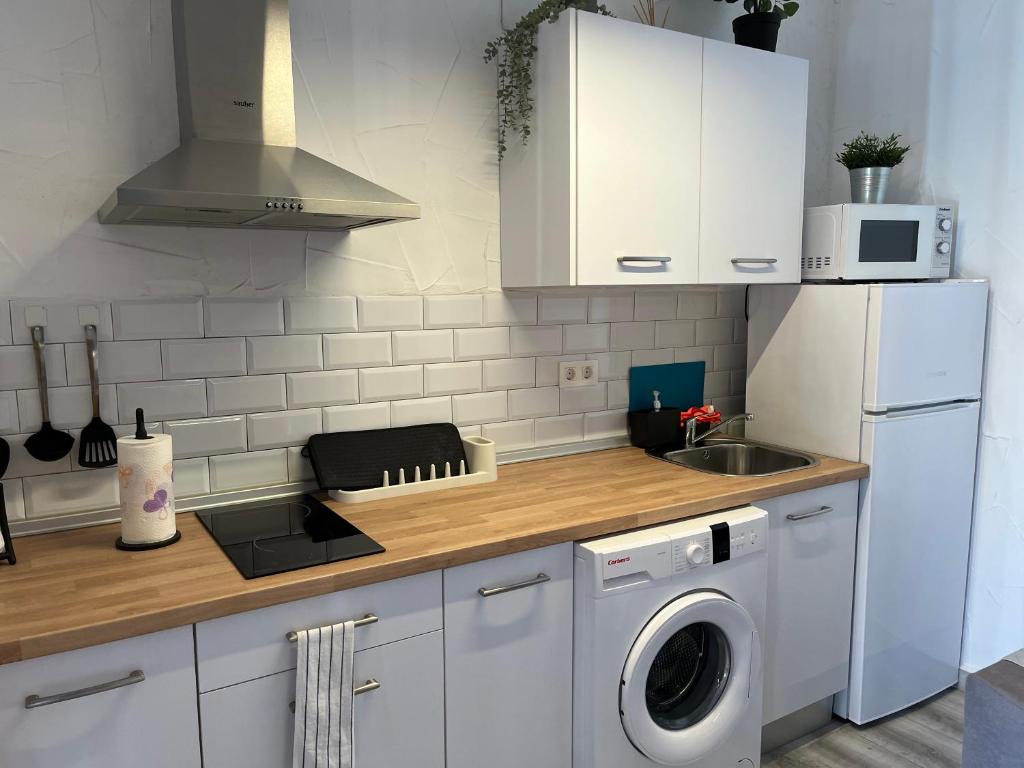 Kuchyňa alebo kuchynka v ubytovaní La Parra Apartamento