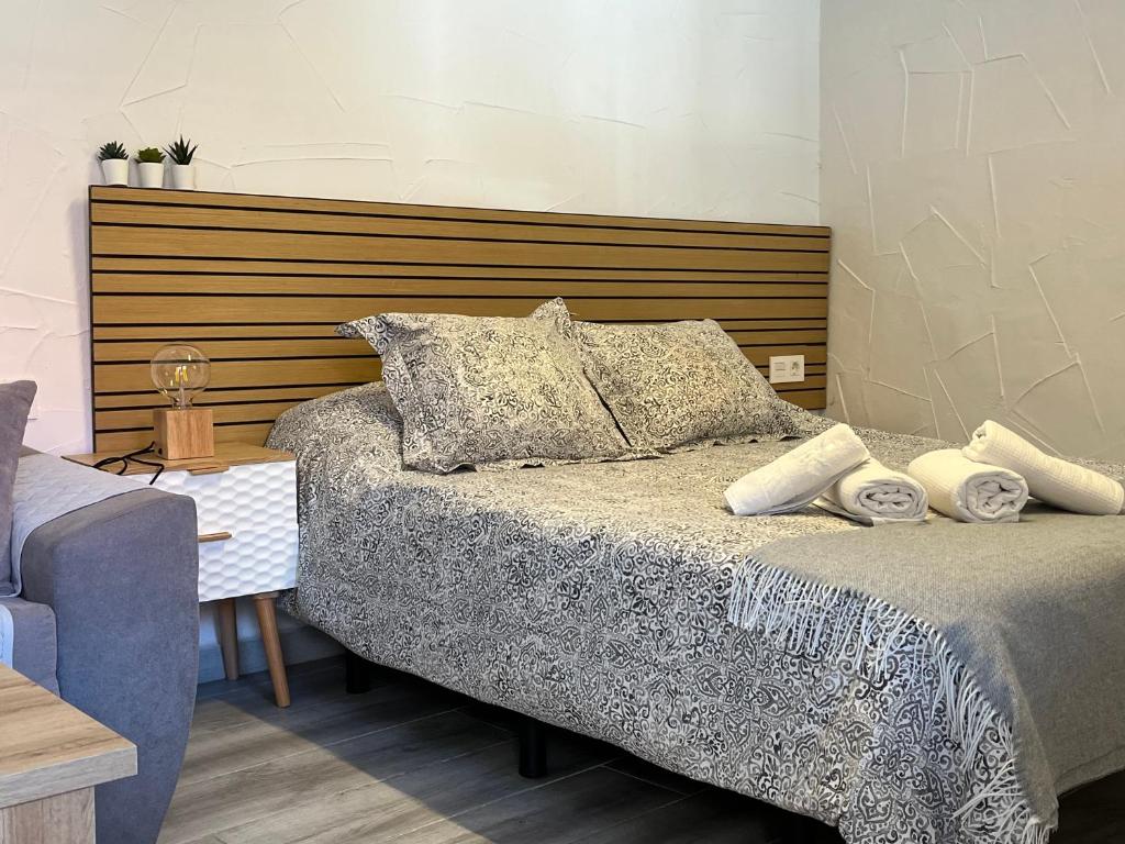 Posteľ alebo postele v izbe v ubytovaní La Parra Apartamento