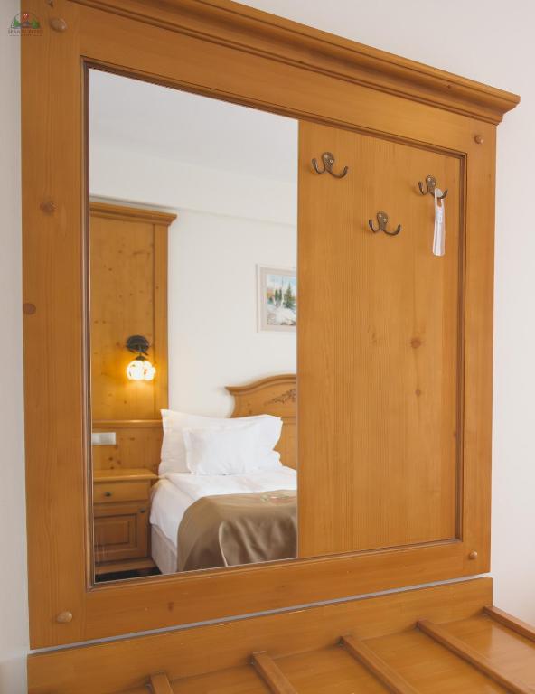 Postel nebo postele na pokoji v ubytování Resort Sf Petru