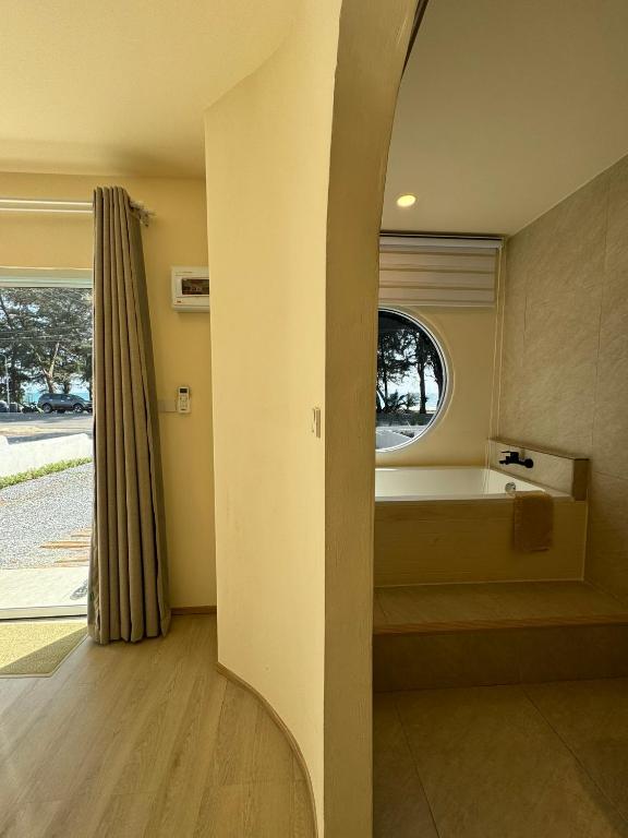 Postel nebo postele na pokoji v ubytování Sunvada Beach Rayong