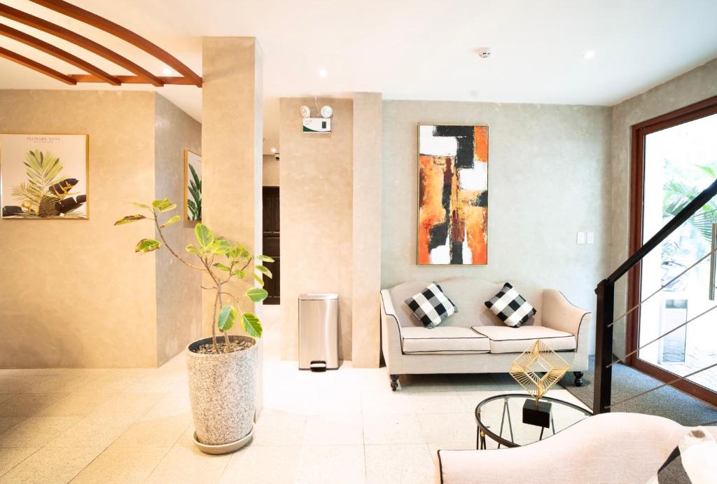 Uma área de estar em J Boutique Hotel El Nido Managed by H Hospitality Group