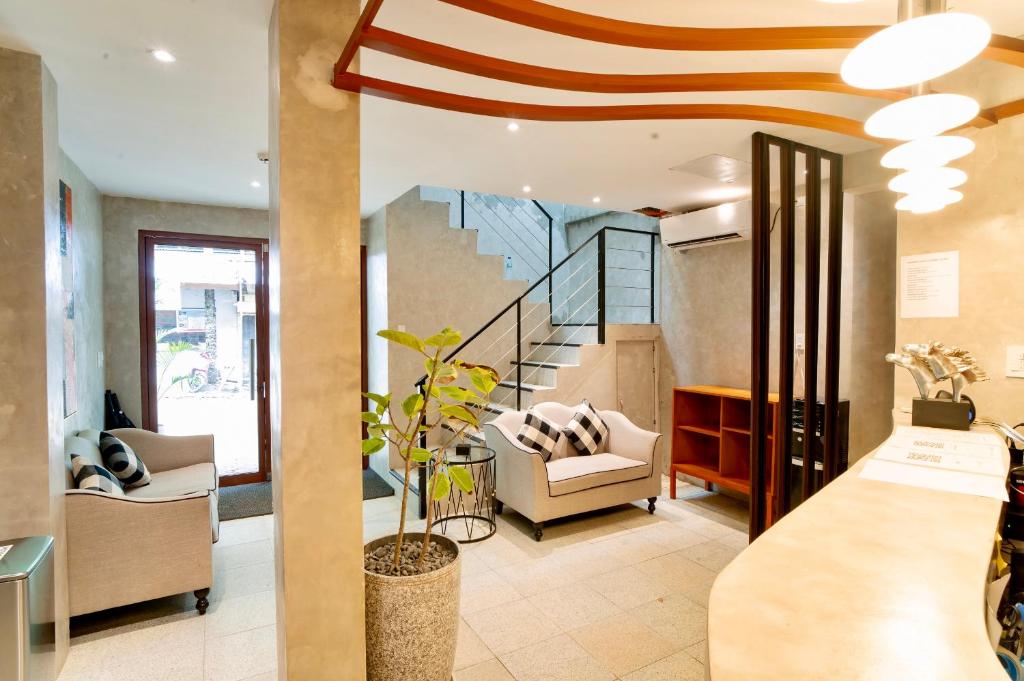 Uma área de estar em J Boutique Hotel El Nido Managed by H Hospitality Group