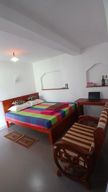 Postel nebo postele na pokoji v ubytování Ella Breeze Homestay
