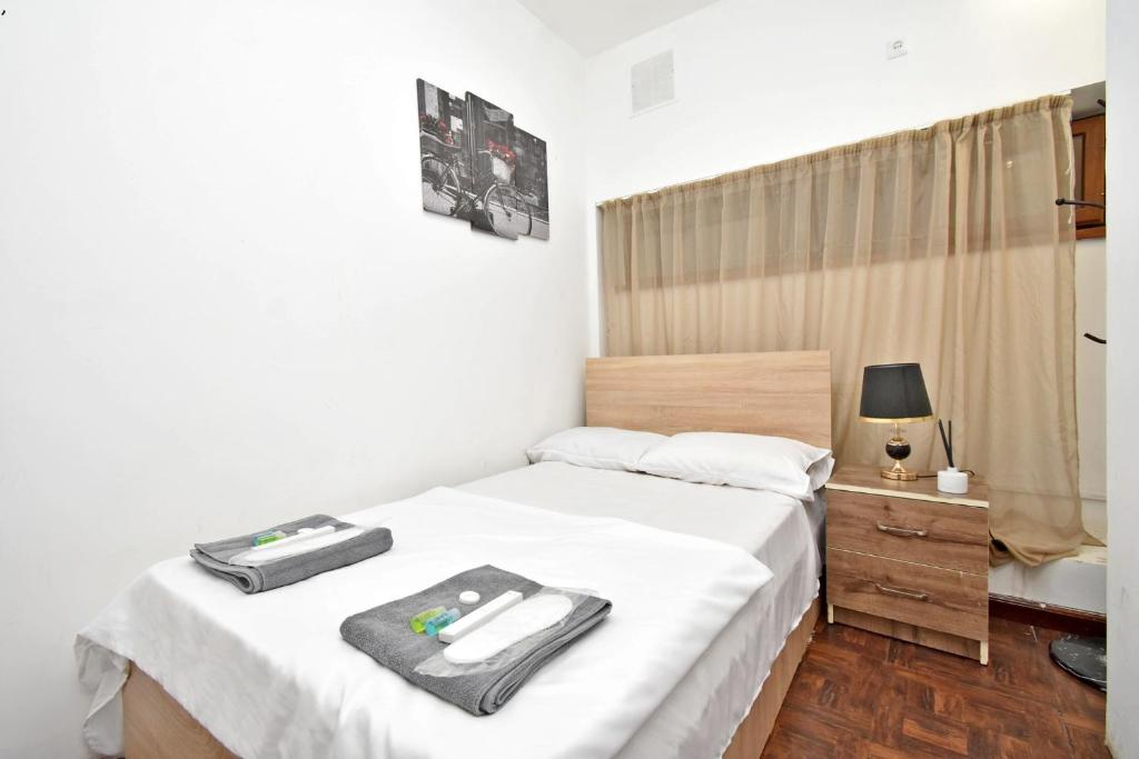 Postel nebo postele na pokoji v ubytování A&S hotel