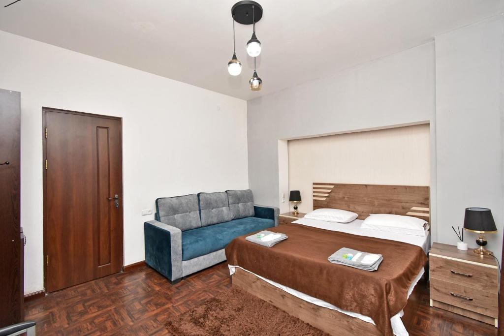 Postel nebo postele na pokoji v ubytování A&S hotel