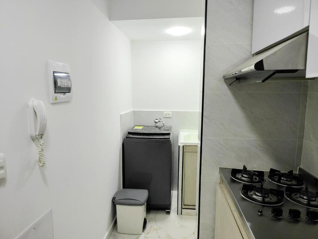 Kuchyň nebo kuchyňský kout v ubytování Apartamento en Girón sector colonial cerca del Aeropuerto