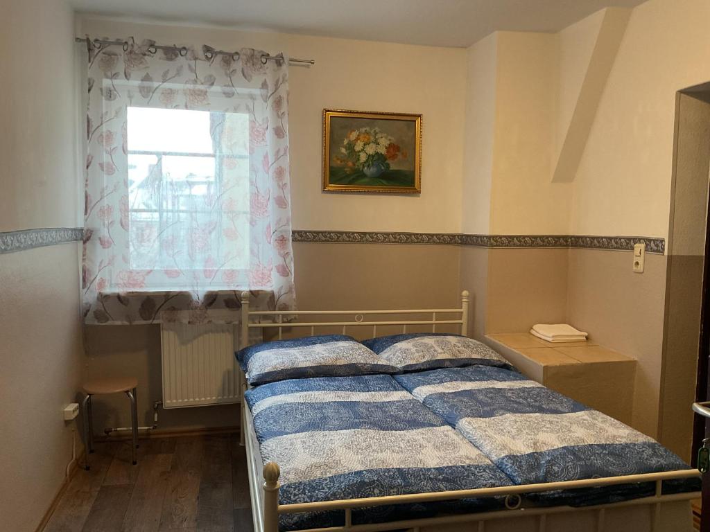 Postel nebo postele na pokoji v ubytování Pension&Hostel Anna - Monteurzimmer