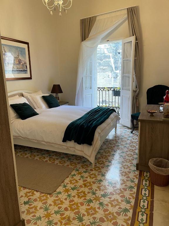 Postel nebo postele na pokoji v ubytování Amelie - Charming Townhouse in the heart of Rabat