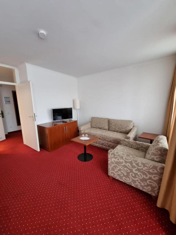 Posezení v ubytování Hotel am Rosenpark