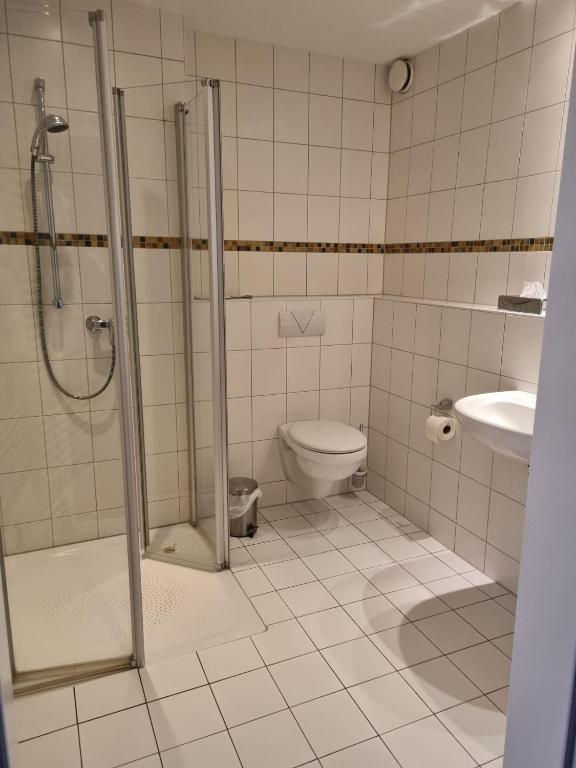 Koupelna v ubytování Hotel am Rosenpark