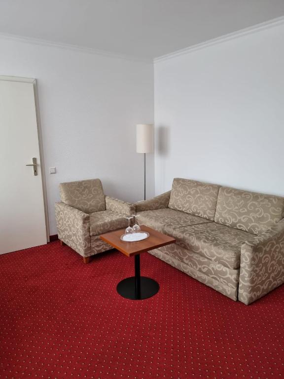 Posezení v ubytování Hotel am Rosenpark