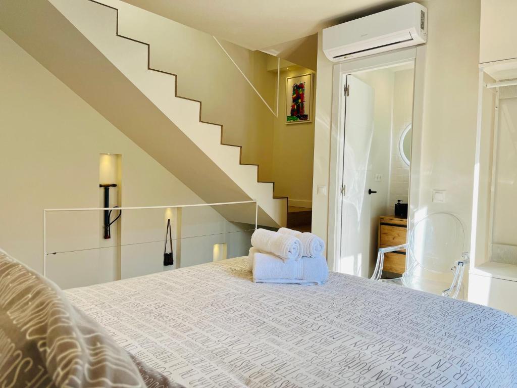 Postel nebo postele na pokoji v ubytování Casa Torre Hacho
