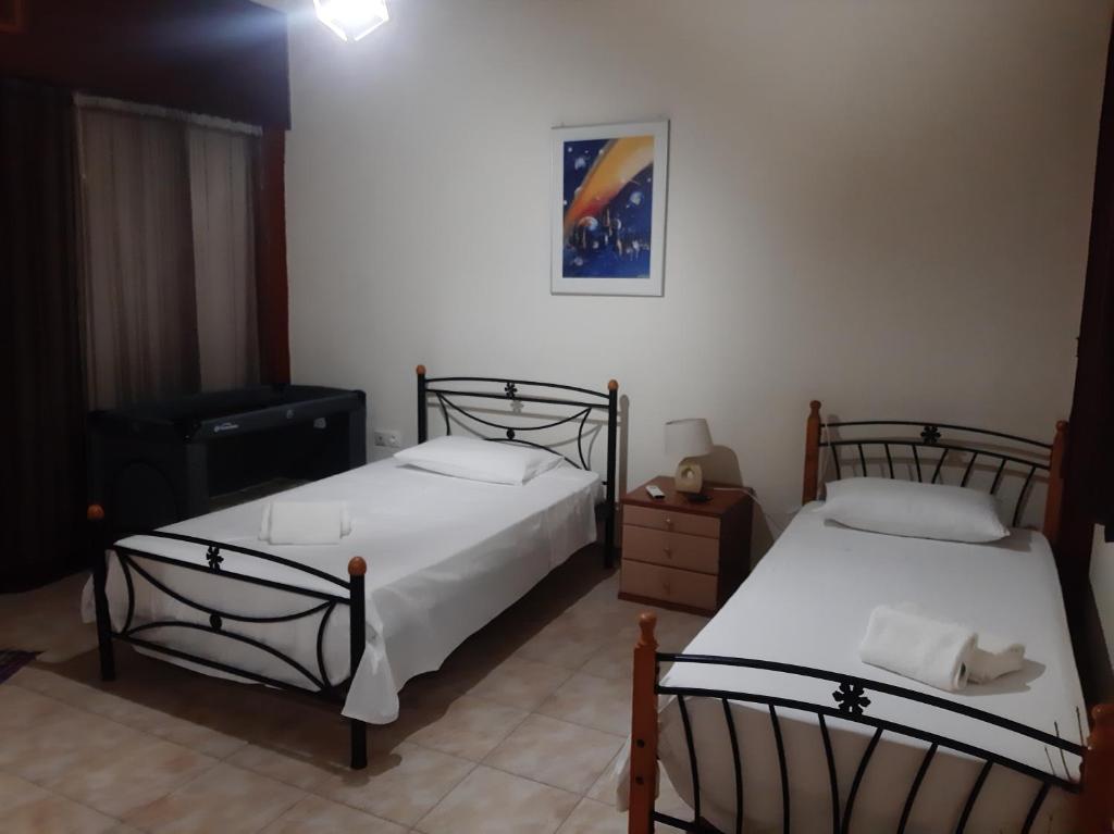 Posteľ alebo postele v izbe v ubytovaní Retro Chic Apartment