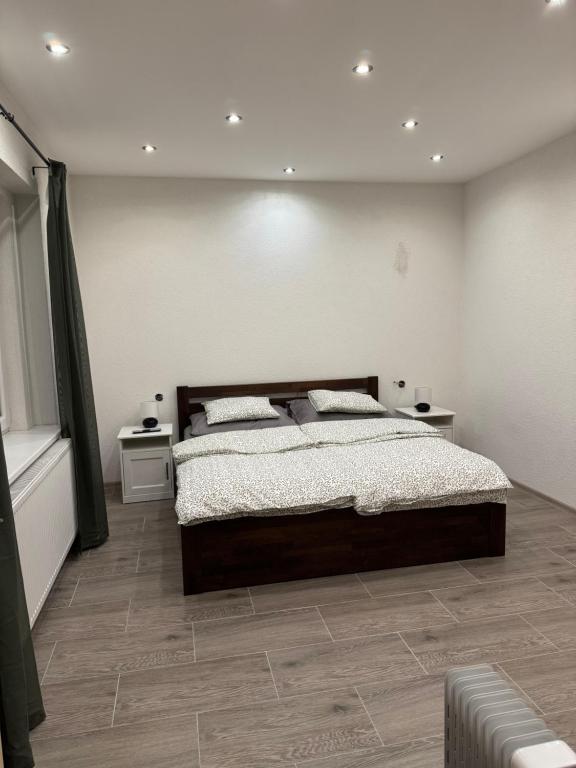 Postel nebo postele na pokoji v ubytování Apartmán Hájovna