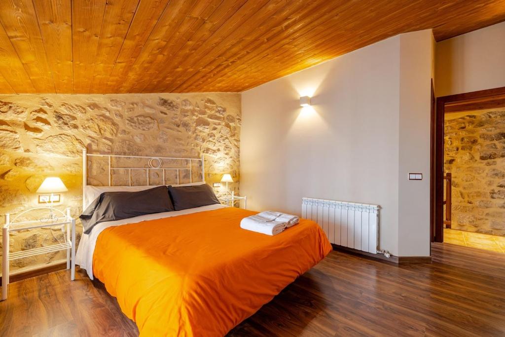 Postel nebo postele na pokoji v ubytování Casa rural Lo Niu