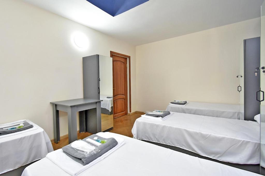 Postel nebo postele na pokoji v ubytování N&A guest house
