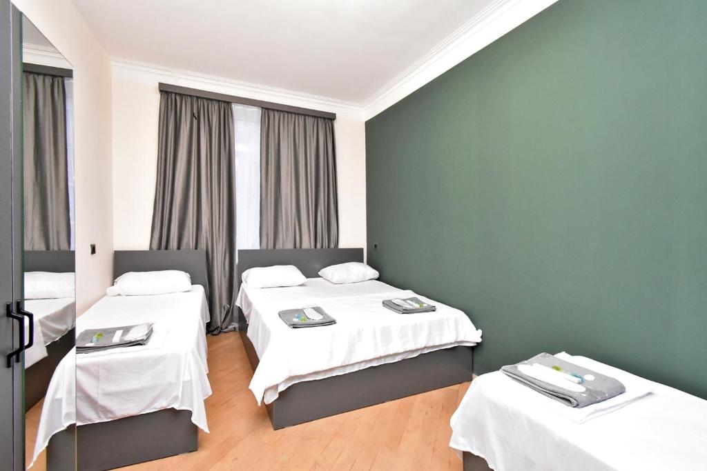 Postel nebo postele na pokoji v ubytování N&A guest house