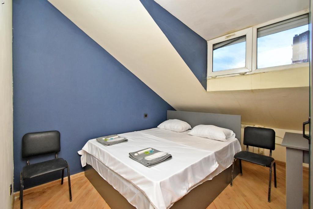 Postel nebo postele na pokoji v ubytování N&A guest house