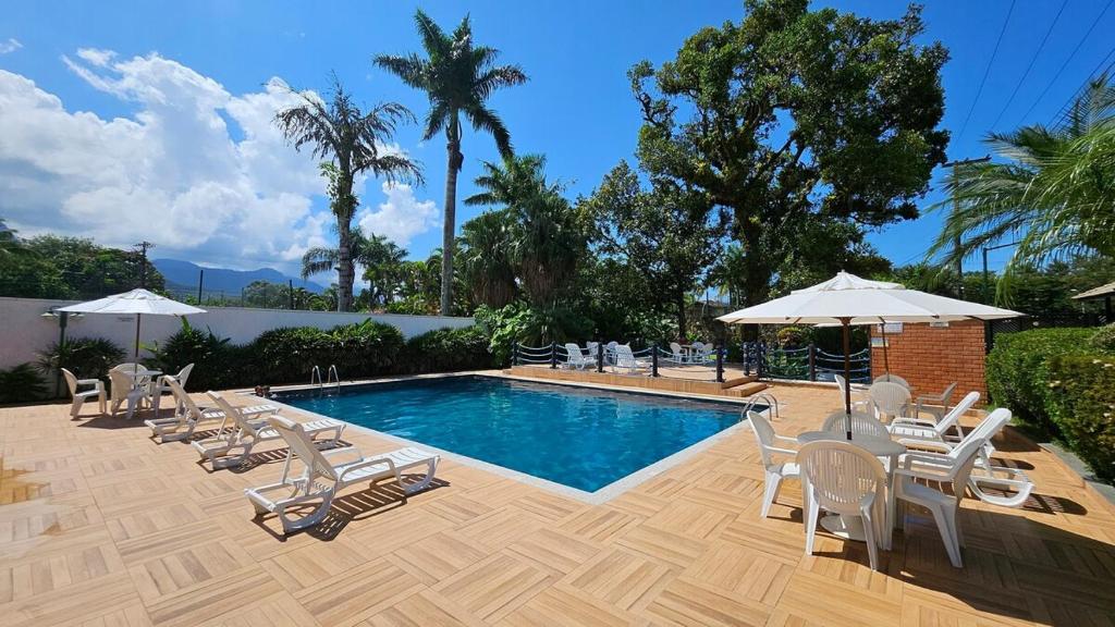 สระว่ายน้ำที่อยู่ใกล้ ๆ หรือใน Flat Maresias Beira Mar