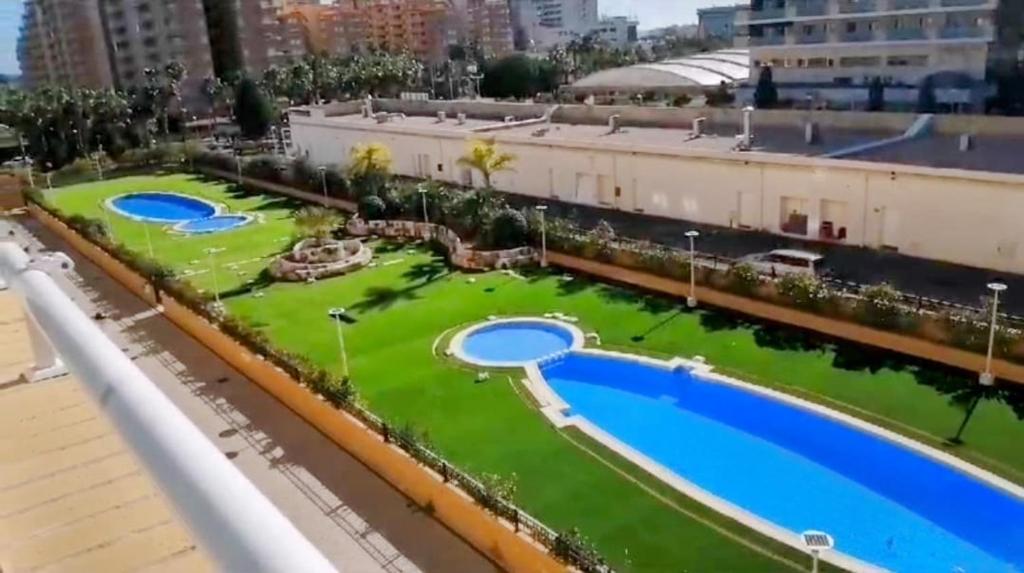 Πισίνα στο ή κοντά στο Edificio Valparaiso,de lujo con wifi