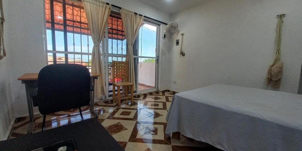 Postel nebo postele na pokoji v ubytování Casa 3 flamencos - estudio y apartamento