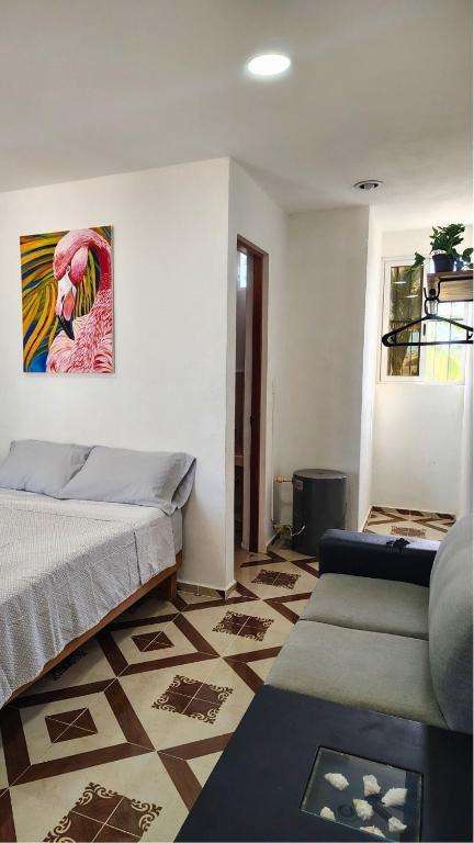 Postel nebo postele na pokoji v ubytování Casa 3 flamencos - estudio y apartamento