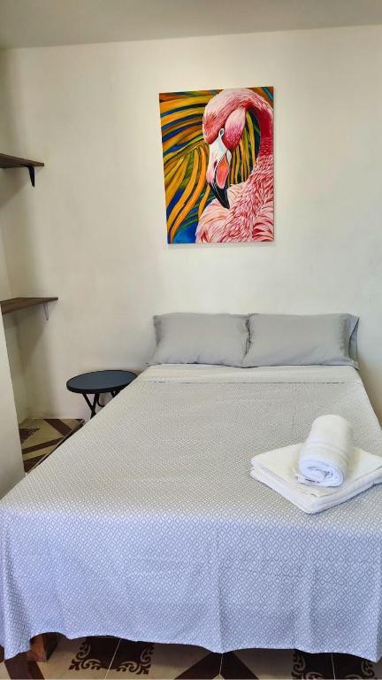 Postel nebo postele na pokoji v ubytování Casa 3 flamencos - estudio y apartamento