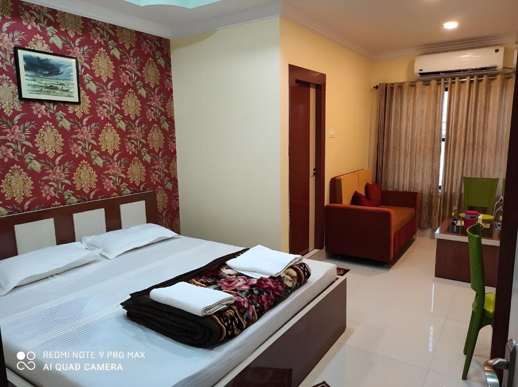 Postel nebo postele na pokoji v ubytování Hotel Royal Sunview