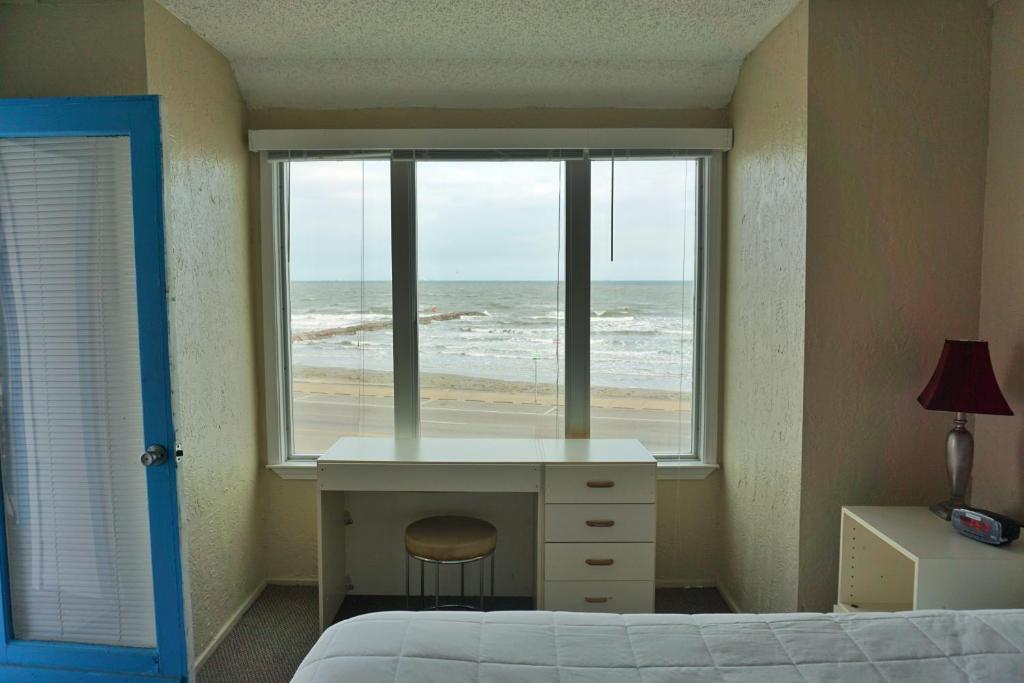 Four Seasons on the Gulfにあるベッド