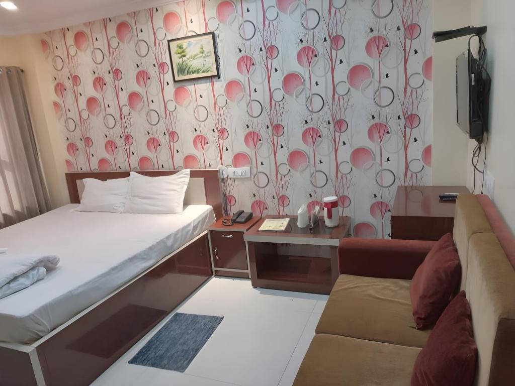 Postel nebo postele na pokoji v ubytování Hotel Royal Sunview