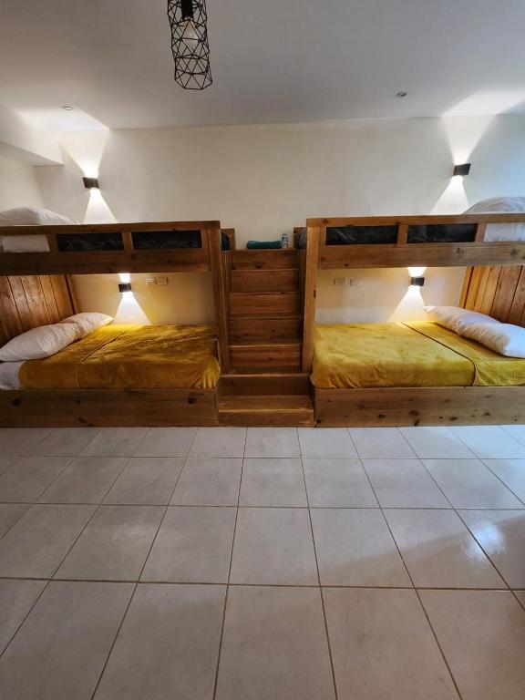 Postel nebo postele na pokoji v ubytování Hotel Bertis