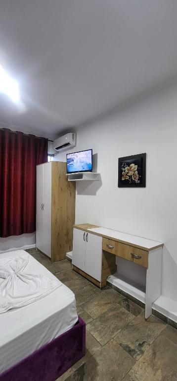 Postel nebo postele na pokoji v ubytování Hotel Kleo