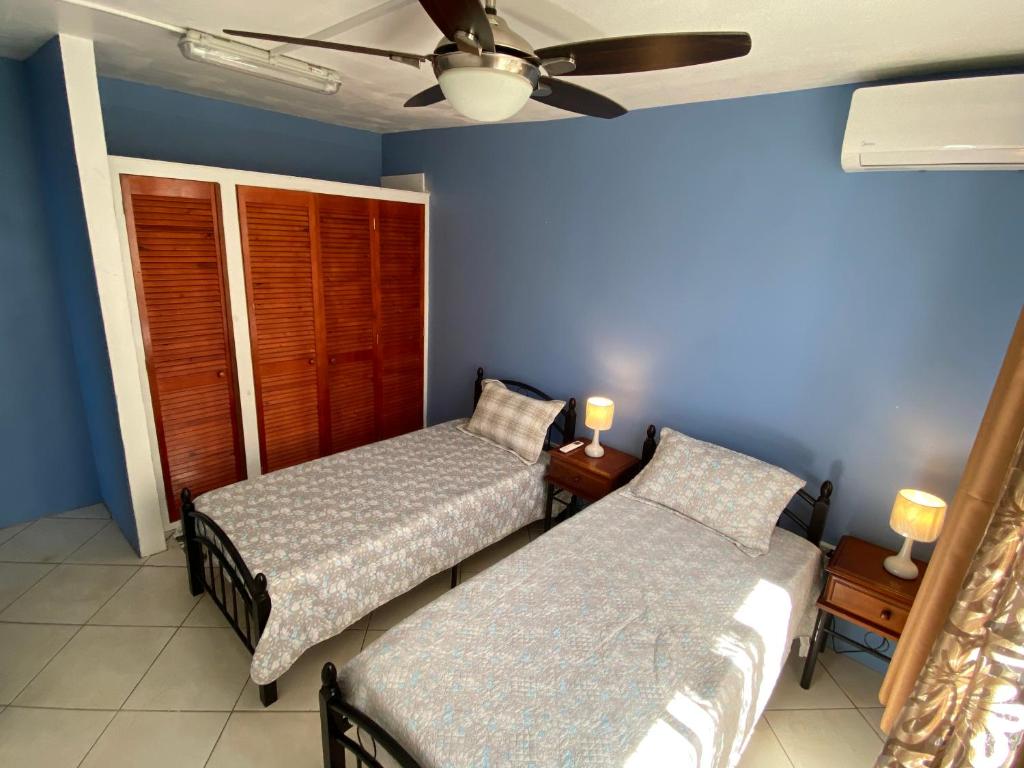 Postel nebo postele na pokoji v ubytování Fortune Sea view Villa