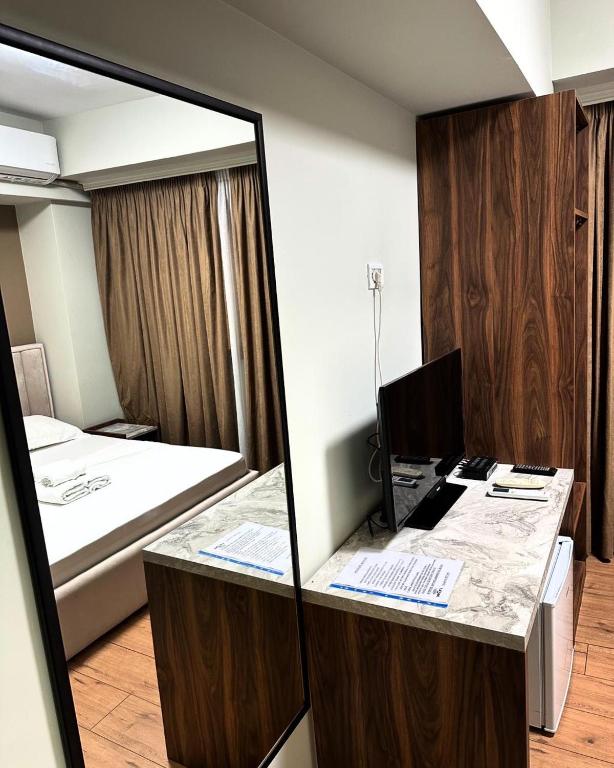 Postel nebo postele na pokoji v ubytování Hotel HER
