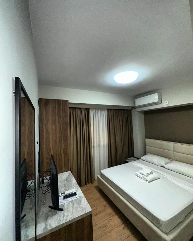 Postel nebo postele na pokoji v ubytování Hotel HER