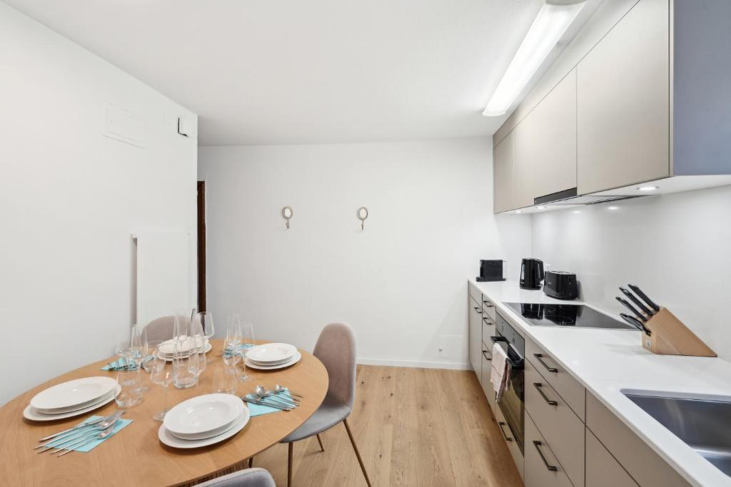 Kuchyň nebo kuchyňský kout v ubytování The R Apartment Randen