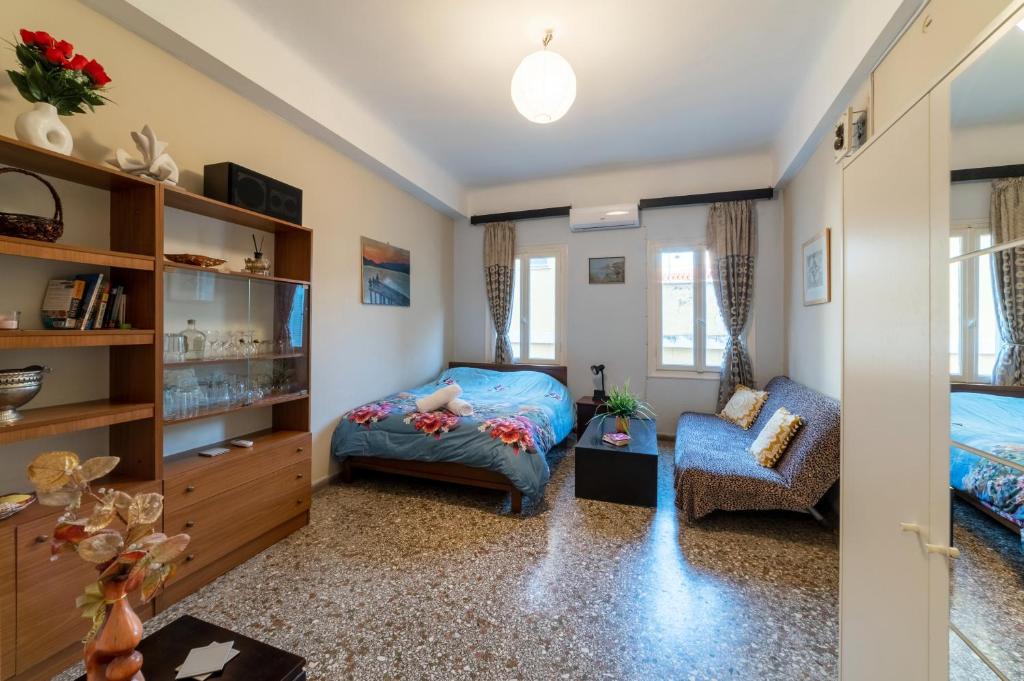 A bed or beds in a room at Acropolis Quiet House