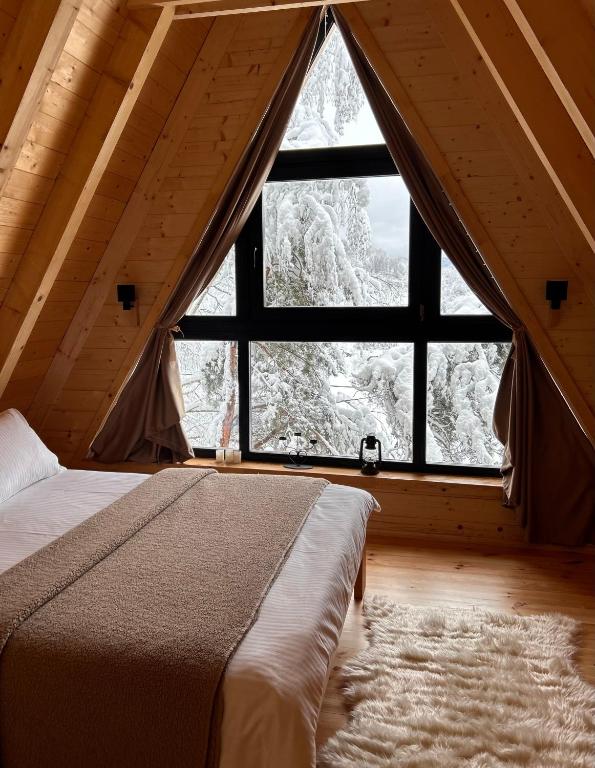 Postel nebo postele na pokoji v ubytování Molika Forest House