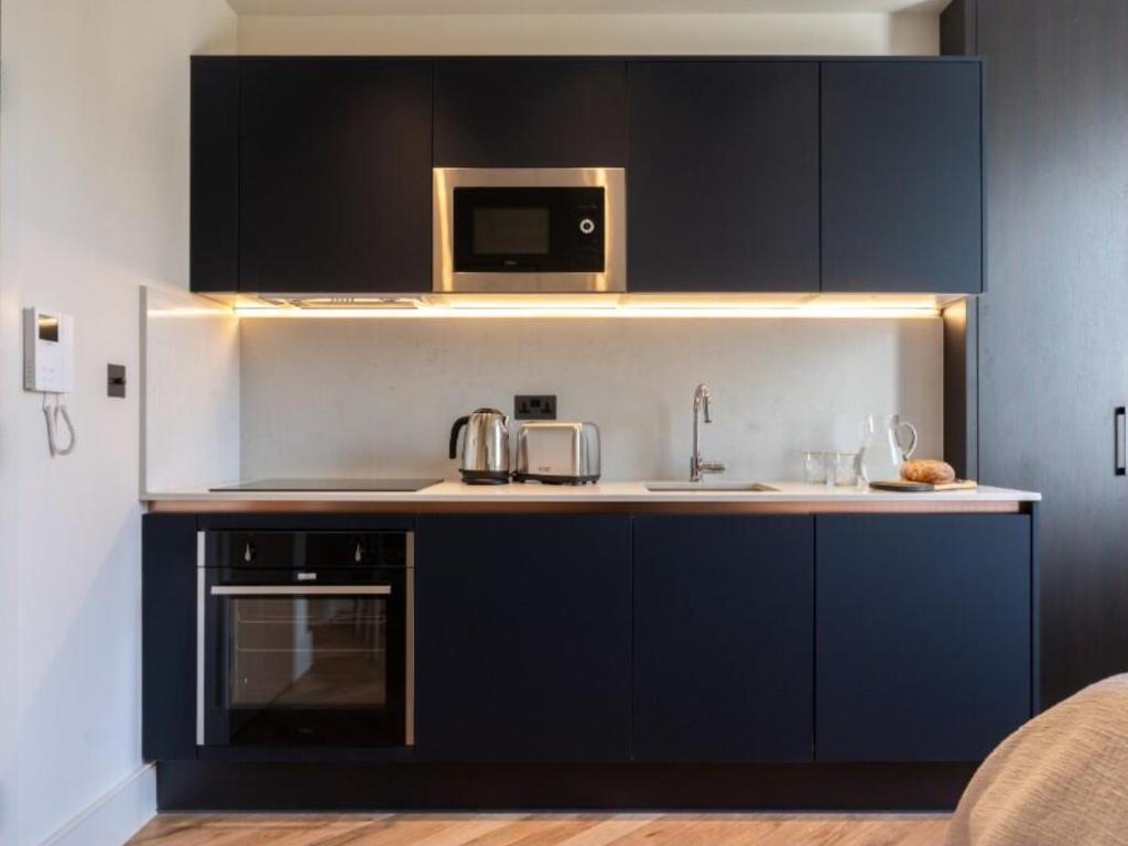 Η κουζίνα ή μικρή κουζίνα στο Central London Ensuite, Exclusive Experiences