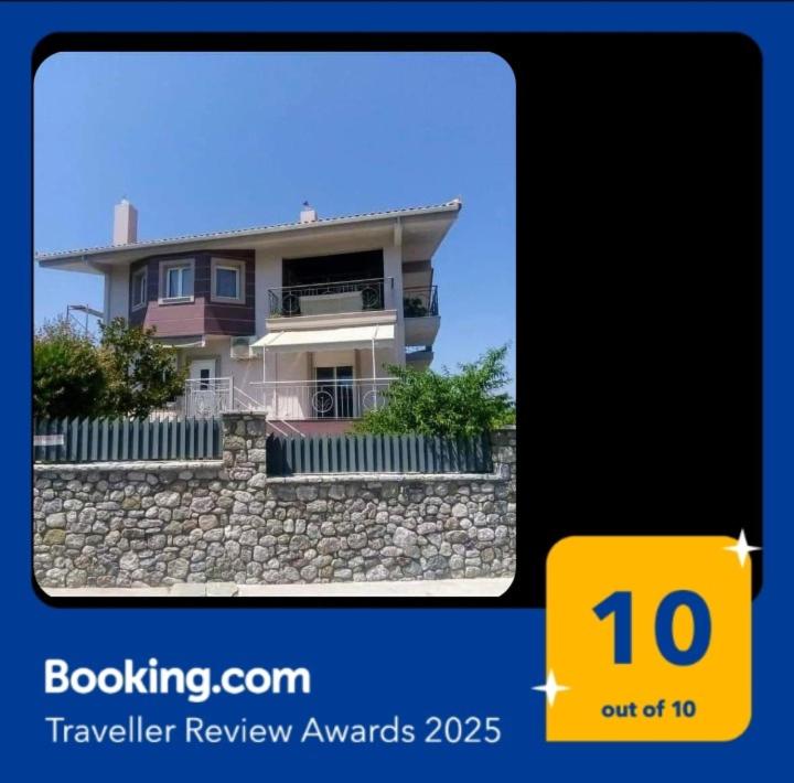 a picture of a house on top of a stone wall at Villa Krina Rosa Aigio in Elíki