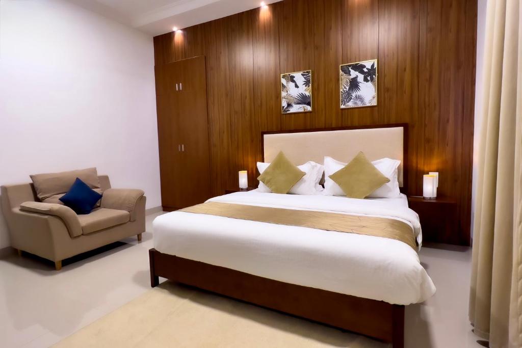 Postel nebo postele na pokoji v ubytování Daar AL Maqam Suites Apartments Salalah