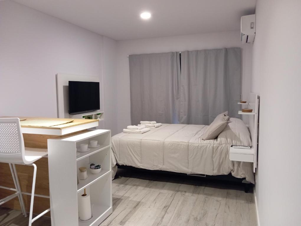 Postel nebo postele na pokoji v ubytování Moderno monoambiente a estrenar, Totalmente equipado, Inmejorable ubicacion