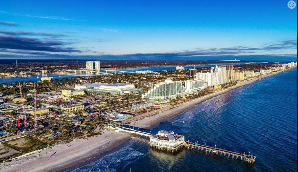 an aerial view of a beach and the ocean at New Fall Rates-8 Mins from Beach-Speedway and Golfing in South Daytona