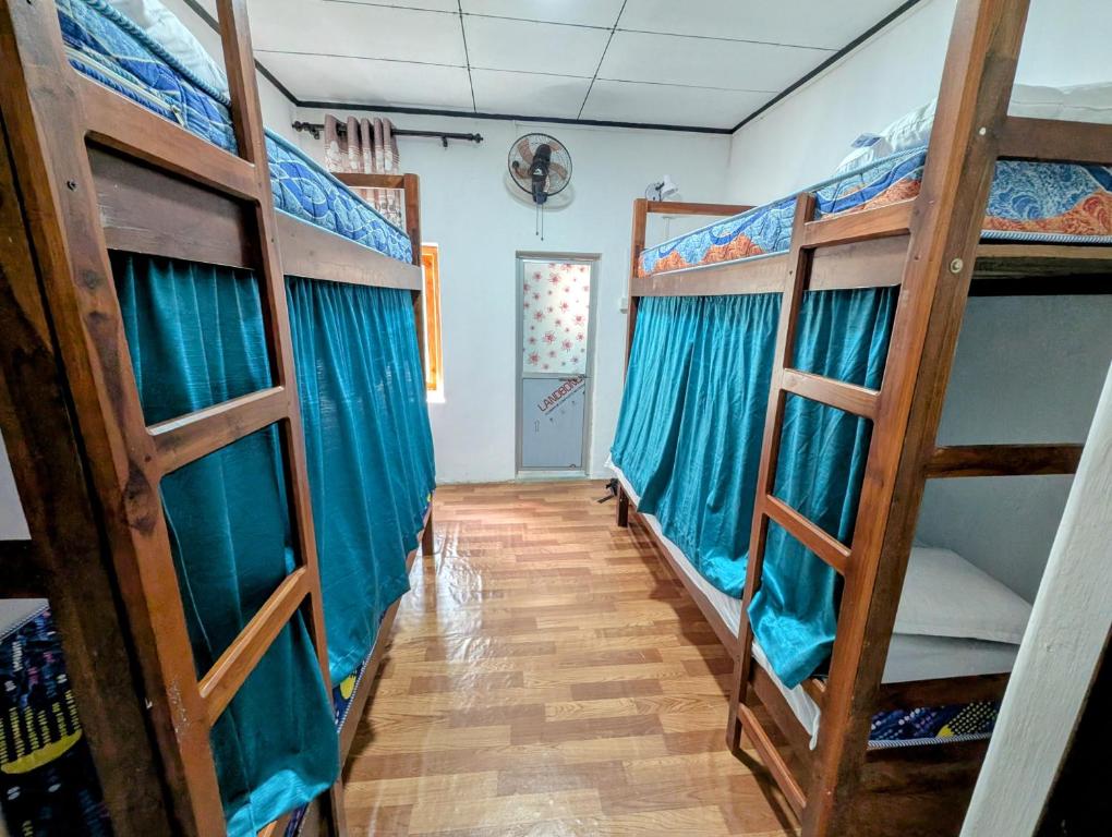 Postel nebo postele na pokoji v ubytování Costels Hiriketiya