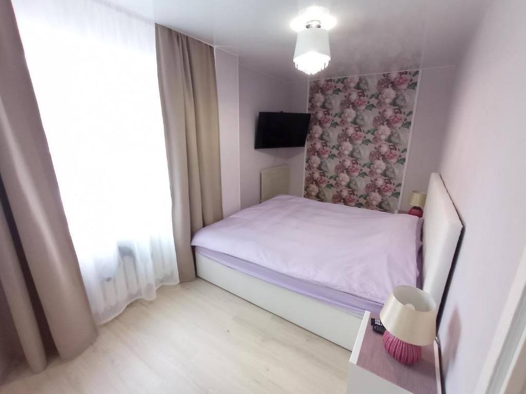 Postel nebo postele na pokoji v ubytování New Võidu apartment