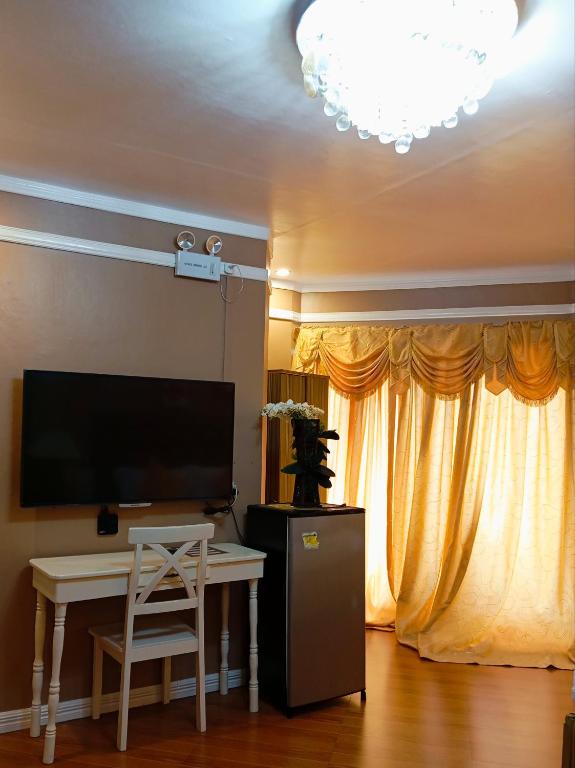 TV a/nebo společenská místnost v ubytování Ladolcevita Inland Resort