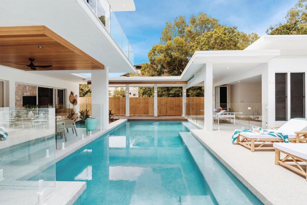 an image of a swimming pool in a house at Belle Escapes Villa by the C in Palm Cove