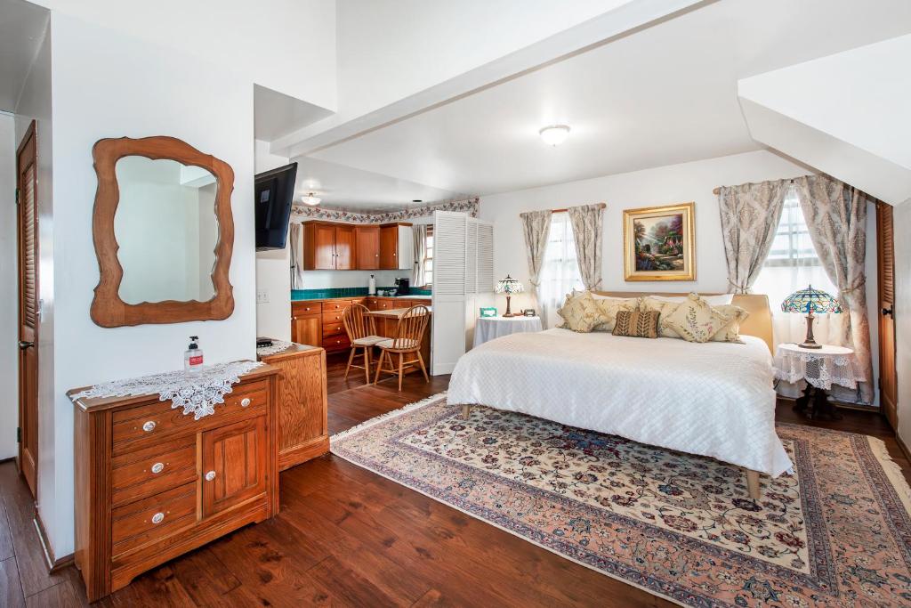 Ένα ή περισσότερα κρεβάτια σε δωμάτιο στο Bath Street Inn