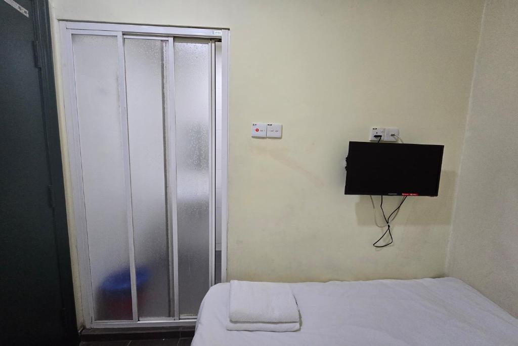 TV a/nebo společenská místnost v ubytování Fast Hotel Sri Gombak