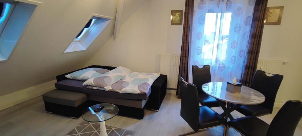 Ein Bett oder Betten in einem Zimmer der Unterkunft Antony Home Ferienwohnung